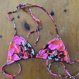 Frankie’s Bikinis. Top size large. NEVER WORN!! would say it would fit a medium
